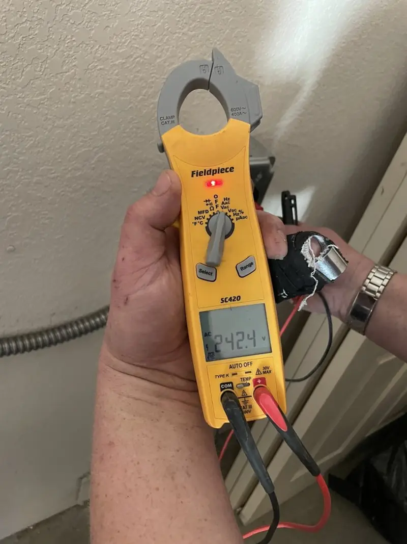 Voltage testing with clamp meter during Generator Installation in Calimesa